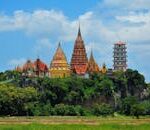 Stunning view of Wat Tham Suea temple in Thailand surrounded by lush greenery.