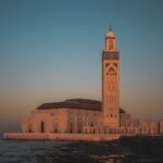 Stunning view of Hassan II Mosque against the sunset sky in Casablanca, Morocco.